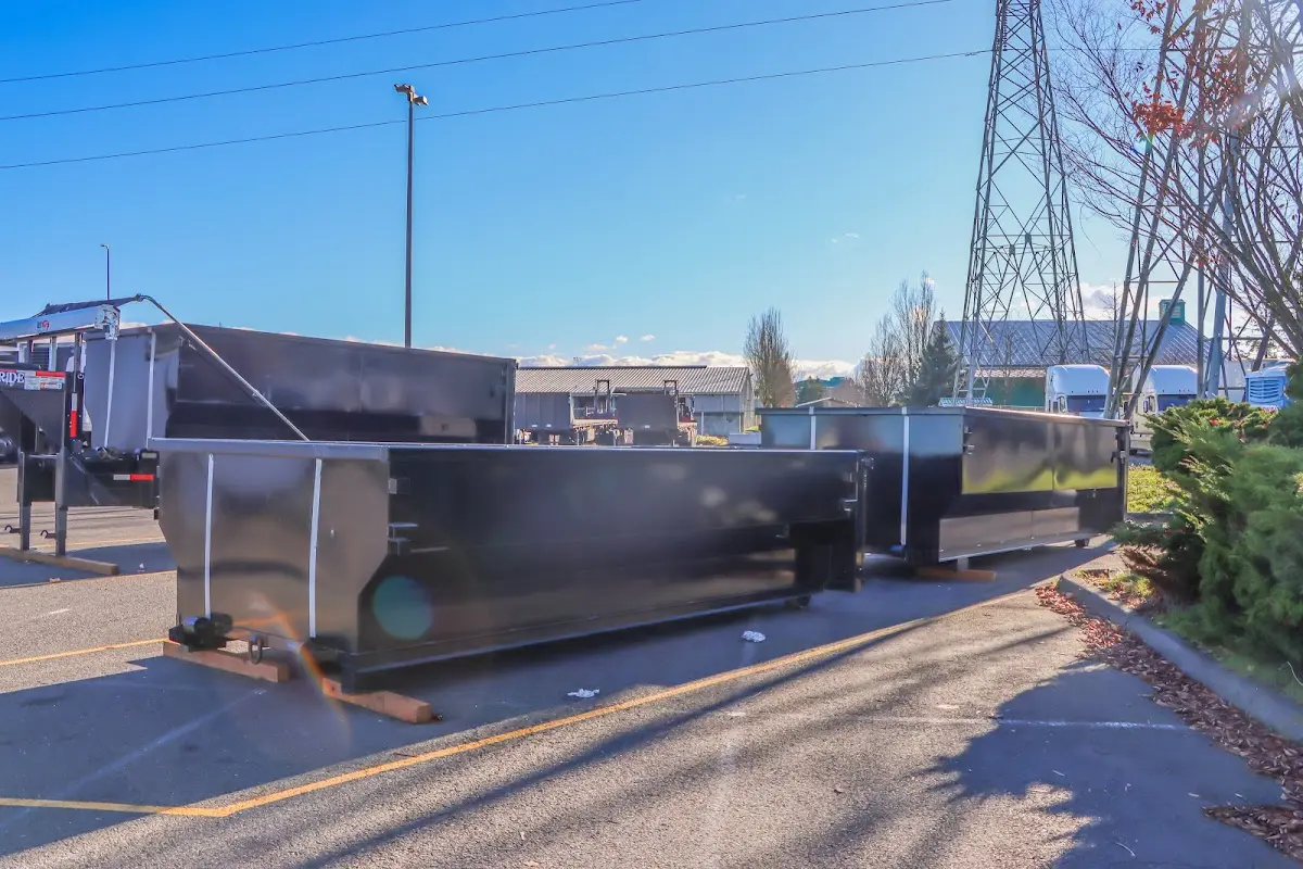 Roll-off dumpster ready for waste disposal at job site for 3 Yard Dumpster Rental in Fairfax